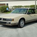 1986 Light Driftwood Metallic Oldsmobile Toronado thumbnail