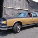 1990 Burgundy Buick Estate Wagon thumbnail