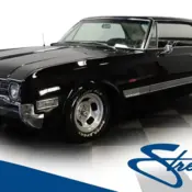 1966 Black Oldsmobile Starfire thumbnail