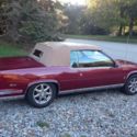 1986 Burgundy Cadillac DeVille thumbnail