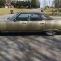 1975 gold Cadillac DeVille thumbnail