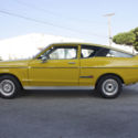 1976 Yellow Datsun B210 thumbnail