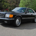 1986 black Mercedes-Benz 500-Series thumbnail
