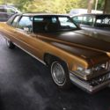 1976 Gold Cadillac DeVille thumbnail