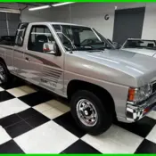 1993 Gray Nissan Truck thumbnail