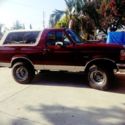 1993 Burgundy Ford Bronco thumbnail