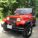 1993 Red Jeep Wrangler thumbnail