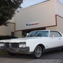 1965 White Oldsmobile Starfire thumbnail