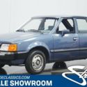 1986 Blue Ford Escort thumbnail