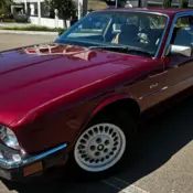 1988 crimson Jaguar XJ6 thumbnail