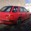 1993 Red Subaru Impreza thumbnail