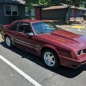 1986 Burgundy Ford Mustang thumbnail