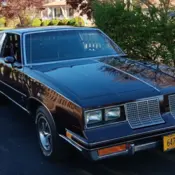 1985 Burgundy Oldsmobile Cutlass thumbnail