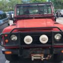 1994 Red Land Rover Defender thumbnail