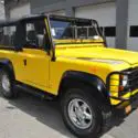 1994 Yellow Land Rover Defender thumbnail