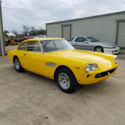 1964 yellow Ferrari 330 GT thumbnail