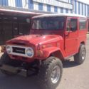 1974 Red and white Toyota FJ Cruiser thumbnail