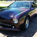 1994 burgundy metal flake Ford Thunderbird thumbnail