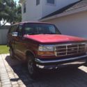 1994 Burgundy Ford Bronco thumbnail
