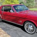 1964 Burgandy Ford Mustang thumbnail