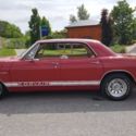 1965 Red Chevrolet Corvair thumbnail