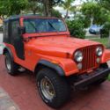 1977 Orange Jeep CJ thumbnail