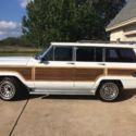 1990 Burgundy Jeep Wagoneer thumbnail