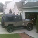 1989 Gold Jeep Wrangler thumbnail