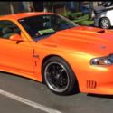1994 Orange Ford Mustang thumbnail