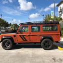 1991 Orange Land Rover Defender thumbnail