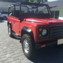 1994 Red Land Rover Defender thumbnail