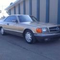 1984 Gold Mercedes-Benz 500-Series thumbnail