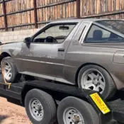 1987 Silver Plymouth Conquest thumbnail