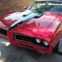 1969 Hot Rod Red Pontiac GTO thumbnail