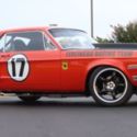 1968 calypso red Ford Mustang thumbnail
