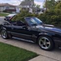 1993 Burgundy Ford Mustang thumbnail