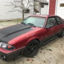 1992 Burgundy Ford Mustang thumbnail