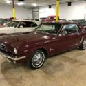 1965 Burgundy Ford Mustang thumbnail