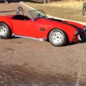 1965 Red Shelby Cobra thumbnail