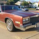 1984 Burgundy Cadillac Eldorado thumbnail