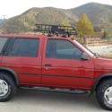 1990 Burgundy Nissan Pathfinder thumbnail