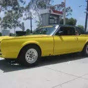 1968 Yellow Mercury Cougar thumbnail