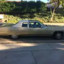 1975 Gold Cadillac DeVille thumbnail