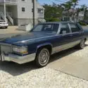 1990 Diplomat Blue Cadillac Brougham thumbnail