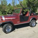 1984 Burgundy Jeep Wrangler thumbnail