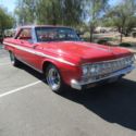 1964 Red Plymouth Sport Fury thumbnail