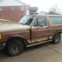 1990 tan Ford Bronco thumbnail