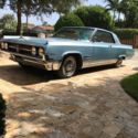 1964 Blue Oldsmobile Starfire thumbnail