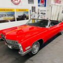 1967 Red Cadillac DeVille thumbnail