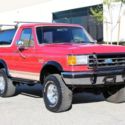 1989 Red Ford Bronco thumbnail